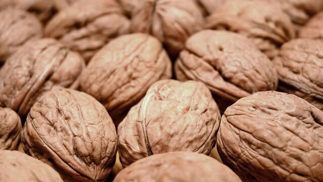 close up of ripe walnuts on table