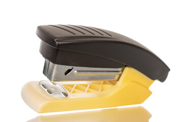 One office stapler, macro, isolated on white background.