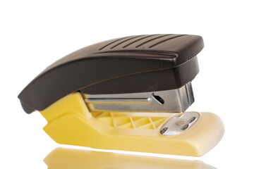 One office stapler, macro, isolated on white background.