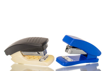 One office stapler, macro, isolated on white background.
