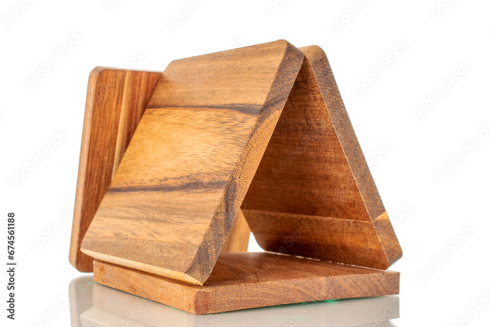 Poster Set of four wooden coasters made of pine, macro, isolated on white background.