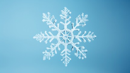 Close up of a blue snowflake. Christmas background
