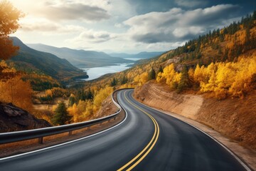 Beautiful Autumn highway with Fall foliage colors forest and lake river mountain in far distance. Autumn seasonal concept.