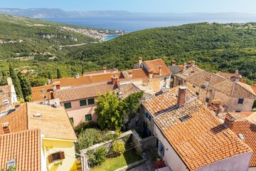 View from the historic town of Labin in Istria to the Croatian seaside resort of Rabac in summer