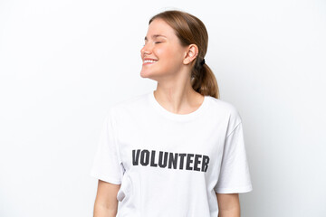 Young volunteer woman isolated on white background laughing