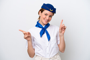 Airplane stewardess woman isolated on white background pointing finger to the laterals and happy