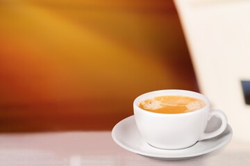 Hot tasty latte coffee in a ceramic cup