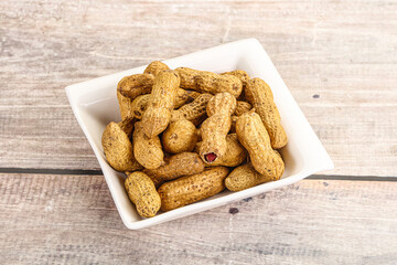 Raw ripe unpeeled peanut heap