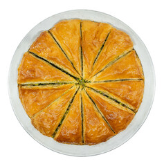 Traditional delicious Turkish Pistachio Baklava dessert slices isolated on white