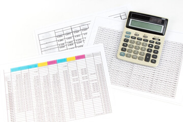 Financial Charts, graphs, coins, calculator on isolated white background.