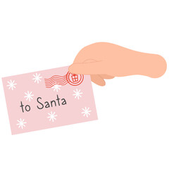 Hand holding a Christmas letter.  Letter to Santa Claus	

