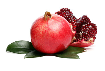 Several ripe pomegranate fruits and an open whole pomegranate, Juicy pomegranate seeds on table, Fresh ripe Pomegranate half isolated on white background, Healthy pomegranates fruit garnet, side view