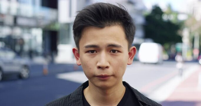 Interview, man and face or talking in street with question, dream job or survey for pilot or city background. Asian, person or student with questionnaire, interviewing and communication in urban road