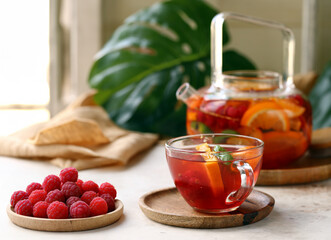 fruit berry citrus tea in a glass teapot