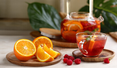 fruit berry citrus tea in a glass teapot