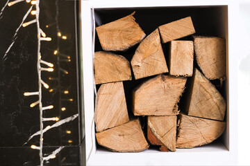 Stacked firewood prepared for indoor fireplace, Christmas decor