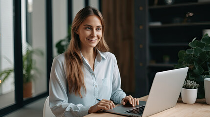 Cheerful pretty lady realtor wear shirt smiling writing emails modern device indoors workplace workstation