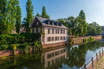 Obraz premium Strasbourg, France. View of the old House of Covered Bridges (Maison des Ponts Couverts) on the embankment of the Ill River.