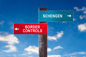 Schengen or Border Controls - Traffic sign with two options - free movement of EU citizens in area of European union vs closing borders and re-established border-crossing and border guards.