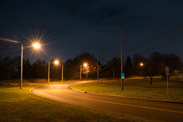 Exit Ramp at Night with Streetlamps Glowing