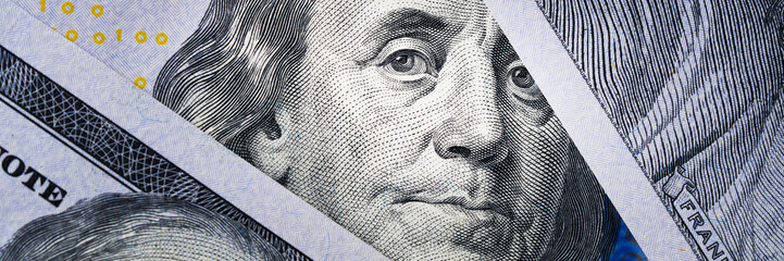 One Hundred Dollars and portrait Benjamin Franklin on USA money banknote.
