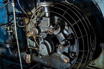 Fototapeta na wymiar Mechanical equipment with an engine and wheels.