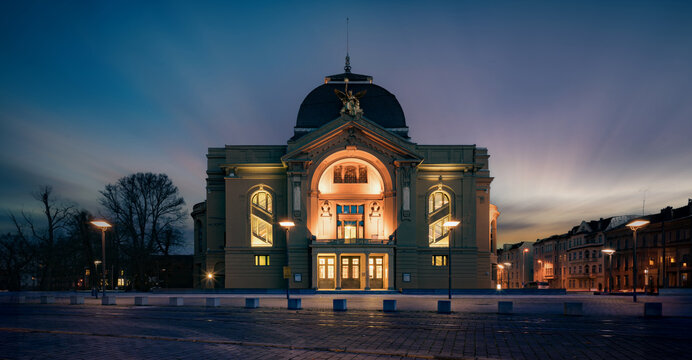 historical theater building in a night city in Europe - Powered by Adobe