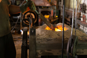 Ferrous metal billet is melted in an induction furnace closeup