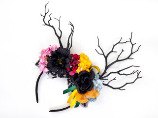 Mystical woodland themed antler headdress with dark antlers and colorful floral décor