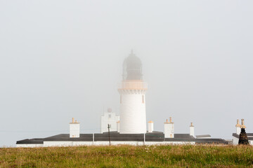 Dunnet Head Lighthouse in clouds