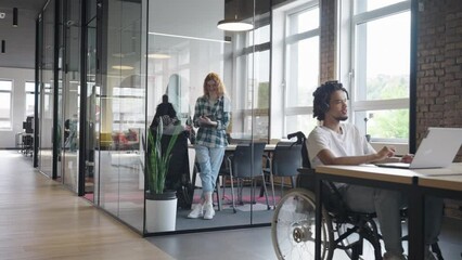 A diverse group of colleagues collaborates using laptops, mobiles, and tablets to tackle business challenges and enhance productivity through teamwork and innovative technology. - Powered by Adobe