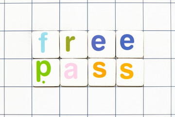 Colorful tile letter in word free pass on white grid background