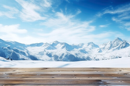 Wooden terrace floor on snowy winter landscape scene with mountains