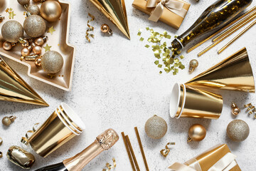 Frame made of party set for New Year celebration on white background