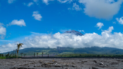 Eruption of Volcano Semeru on the island of Java. The volcano emits ash and smoke. Natural disaster. December 2022.
