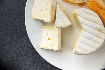 white soft cheese mold fresh creamy taste eating appetizer meal food snack on the table copy space food background rustic top view