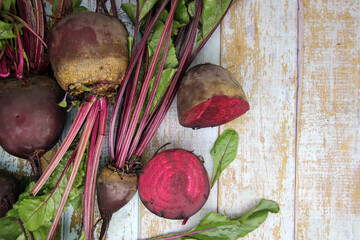 Fresh beets on a wooden surface.  Best diet background.