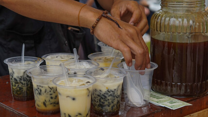Dawet drink originates from Java in Indonesia, made from glutinous rice flour poured with brown...
