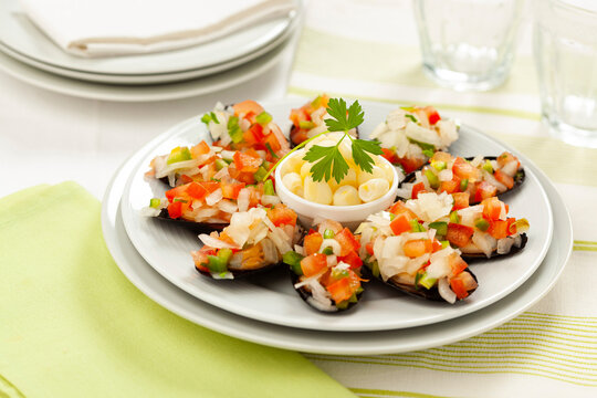 Choros A La Chalaca. Traditional Peruvian food with mussels and vegetables.