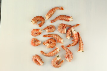 frosted king prawns closeup photo on white table background © ulianna19970