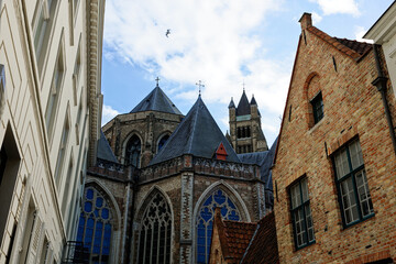 Bruges Belgium - 08 01 2023: Historic city center of Brugge, West Flanders province. Ancient medieval architecture of Bruges old town. Canals and stone paving streets cityscape with famous Burg Berg