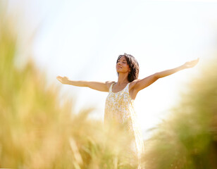 Fototapeta na wymiar Peace, freedom and woman with arms raised at field outdoor in the countryside in spring. Person in nature, eyes closed and meditation to relax at farm, breathe fresh air and enjoy vacation on mockup
