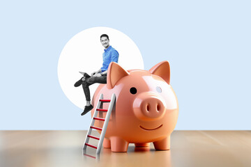 Businessman with laptop on a stack of sitting at a piggy bank in living room background. Success...