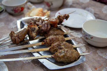 A kind of traditional dish where iron rods are inserted into the middle of the meat and it is cooked well and consumed