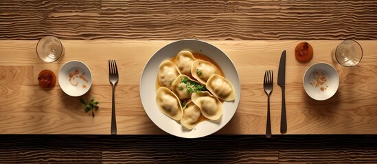 Pierogi served on a wooden dining table