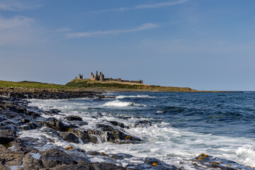 beach and rocks dunstanburgh castle