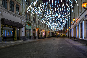 Stoleshnikov lane in Moscow, Russia. Moscow street with Christmas decoration.
