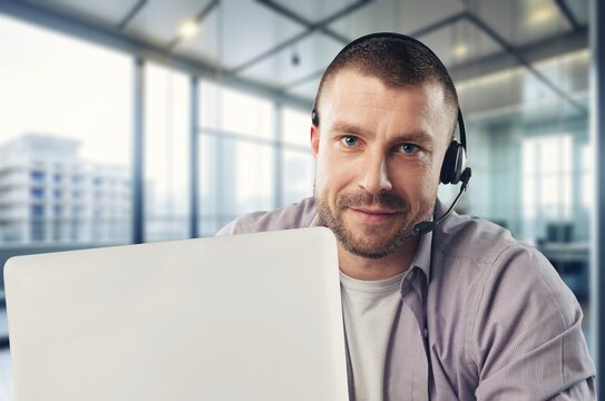 Technical support worker with a headset in modern office, AI generated image