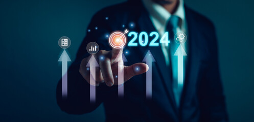concept of business goals and success Startup for business ,Businessman use fingers to tap dart...