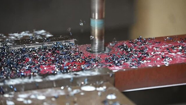 Slow motion scene the hole bore cutting on CNC milling machine by indexable tools.